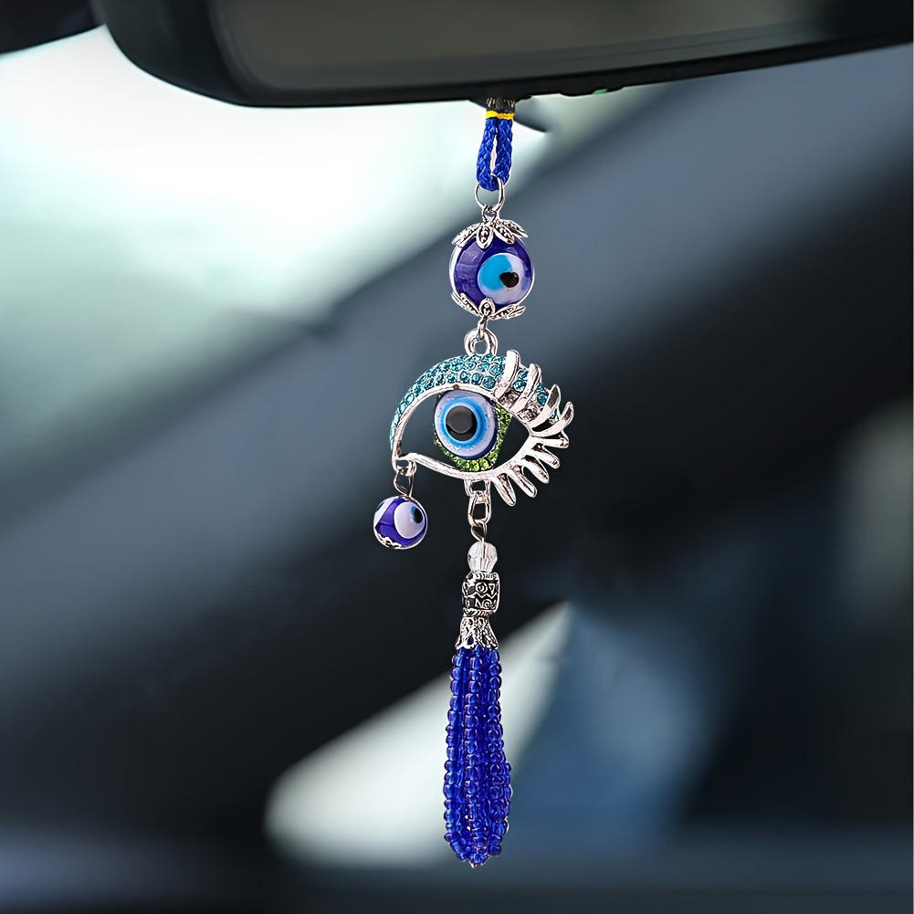 1個の青い魅惑的な目玉タッセルカーペンダント、長いまつげ付き - Car Accessories Evil Eye のレビューと価格