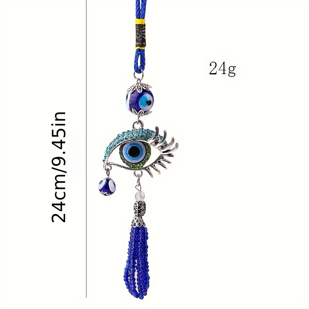 1個の青い魅惑的な目玉タッセルカーペンダント、長いまつげ付き - Car Accessories Evil Eye のレビューと価格