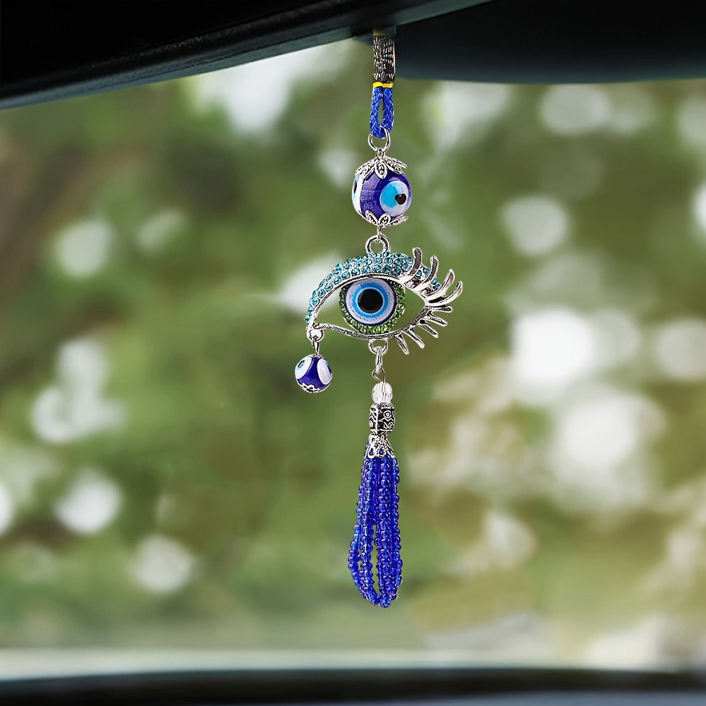1個の青い魅惑的な目玉タッセルカーペンダント、長いまつげ付き - Car Accessories Evil Eye のレビューと価格